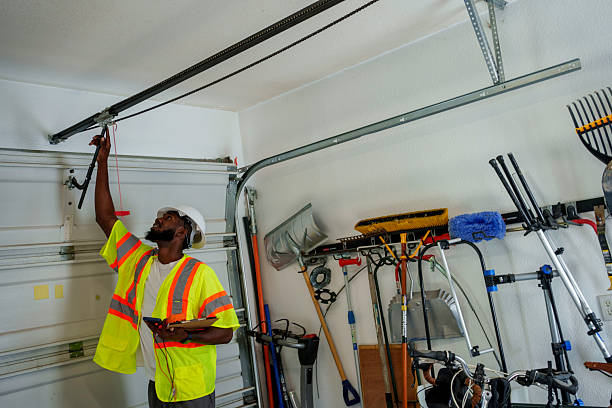 Professional Garage Door Panel Replacement technician working in Fair Haven, NY